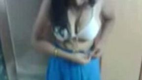 Cute amateur dark haired girlie gets rid of lingerie to show her tits